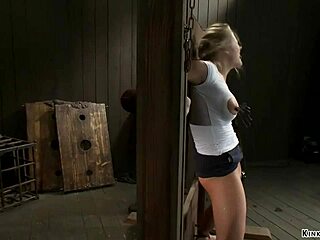 A blonde tied up with a device inserted into her anus