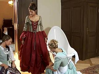 Two young beauties ride dildos in intense lesbian fucking