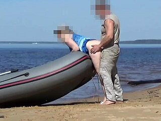 Lady tourist hooks up with boatman on beach
