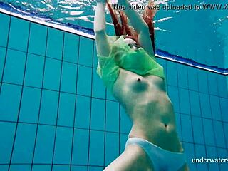 Nina Mohnatka flaunts her hairy pussy on the beach