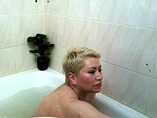 Mature Russian Bitch Masturbates in Shower
