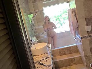 Vicky vette cleans up in the bathroom after a cumshot on her tits