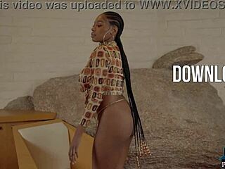 Huge natural tits ebony model Nyla strips everything off.