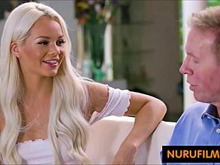 A blonde masseur gives a blow job to a dad after a massage