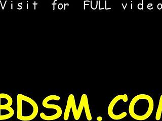 Remarkable blonde lady is playing with a huge sex-toy in bondage bdsm