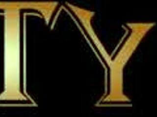 Busty MILF mentor and grateful ebony model share a moment