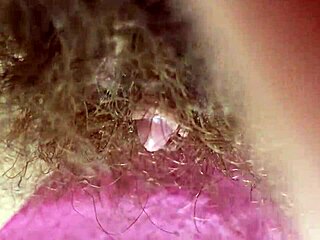 Extreme closeup of wet hairy pussy orgasm