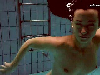 Alla strips naked for steamy pool swim