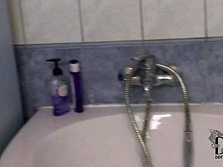 Lataya Roxx, a busty adult movie actress, washes her natural 36D breasts with soap in the bathtub