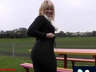 mature milf walking with big ass in leggings in park