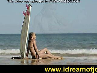 surfs up on the beach with a brunette solo