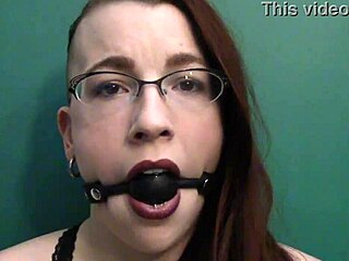 Dark Lipstick Ballgag Drooling in Intense Close-Up Eye Contact