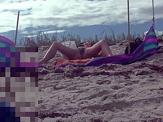 Caribbean housewife gives old man a handjob on beach