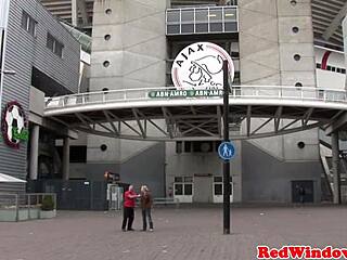 I am an inked goth prostitute spoiling this Amsterdam tourist with my mouth on his cock and ass in boots.