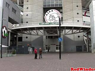 I am an inked goth prostitute spoiling this Amsterdam tourist with my mouth on his cock and ass in boots.