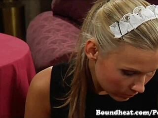 A blonde maid serves her European mistress by giving her a foot massage with oral sex