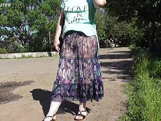 A mature woman in a see-through dress