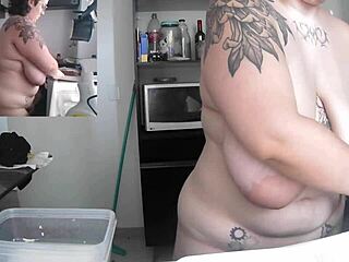 Washing dishes without clothes is very exciting