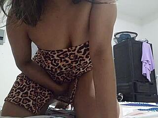 Stepmom in tiger outfit teases herself to a wet finish in real homemade clip.