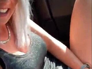Amazing blonde masturbates to orgasm in public car