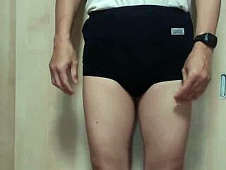 Teen Amateur in Gym Costume Blushes with Buttplug and Pierced Nipples