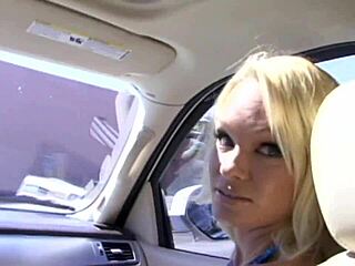 Tyann Mason, blonde with big fake tits, gets cum coated.