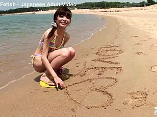 Skinny Japanese chick enjoys having a photoshoot on the beach