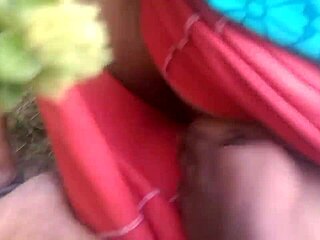 An Indian woman with big tits is showing her boobs in a steamy video