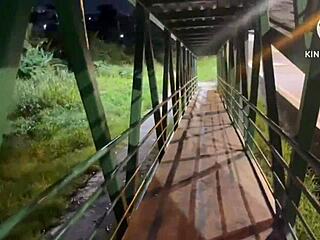 wife having sex with guy in public light