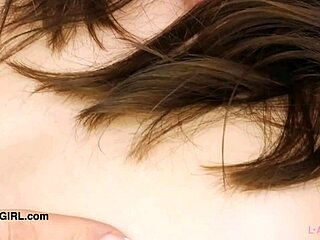 Descriptive Fresh-Faced Brunette Teen Poses on Sofa Gracefully