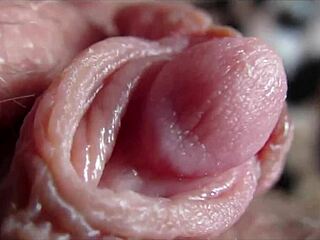 Big clit pulses in closeup as she reaches intense orgasm with wet pussy rubbing