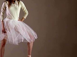 Blonde Russian gymnast demonstrates flexible acrobatic stretching in gym workout routine