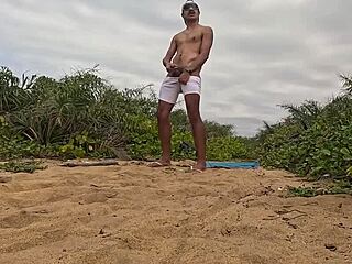 hey, check out this intense handjob and cumshot on the beach with african vibes