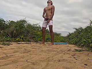 hey, check out this intense handjob and cumshot on the beach with african vibes