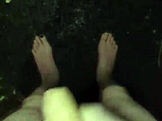 Masturbating with big cock in the rain outdoors naked