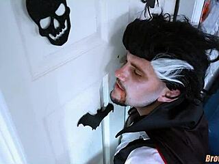 Hey, check out this black hottie at the Halloween glory hole! 🎃🍆