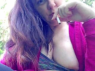 Nicoletta Smokes In Public Garden Flashing Huge Big Tits Outdoors