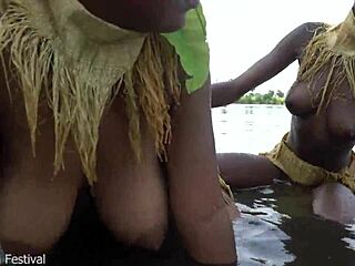 two african zulu women bathing outdoors in village ranch which big tits look better to you