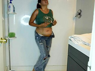 Latina gets pants and panties wet then strips for shower time