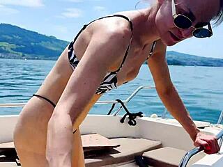 Hey, check out this boat wash in a sexy thong swimsuit now that summer is here!