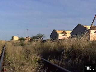 Hey, this adventurous beauty enjoys solo time in an abandoned railroad car with her toys