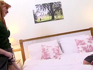 shaved redhead bends over for strapon domination thrill