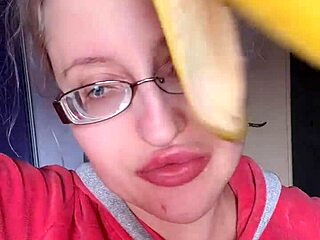 mmm my glossy pink lips devour banana with long nails glasses