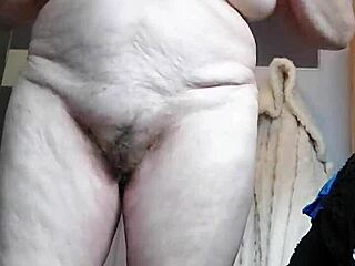 Grandma stuffs her hairy pussy deep with a fresh cucumber now